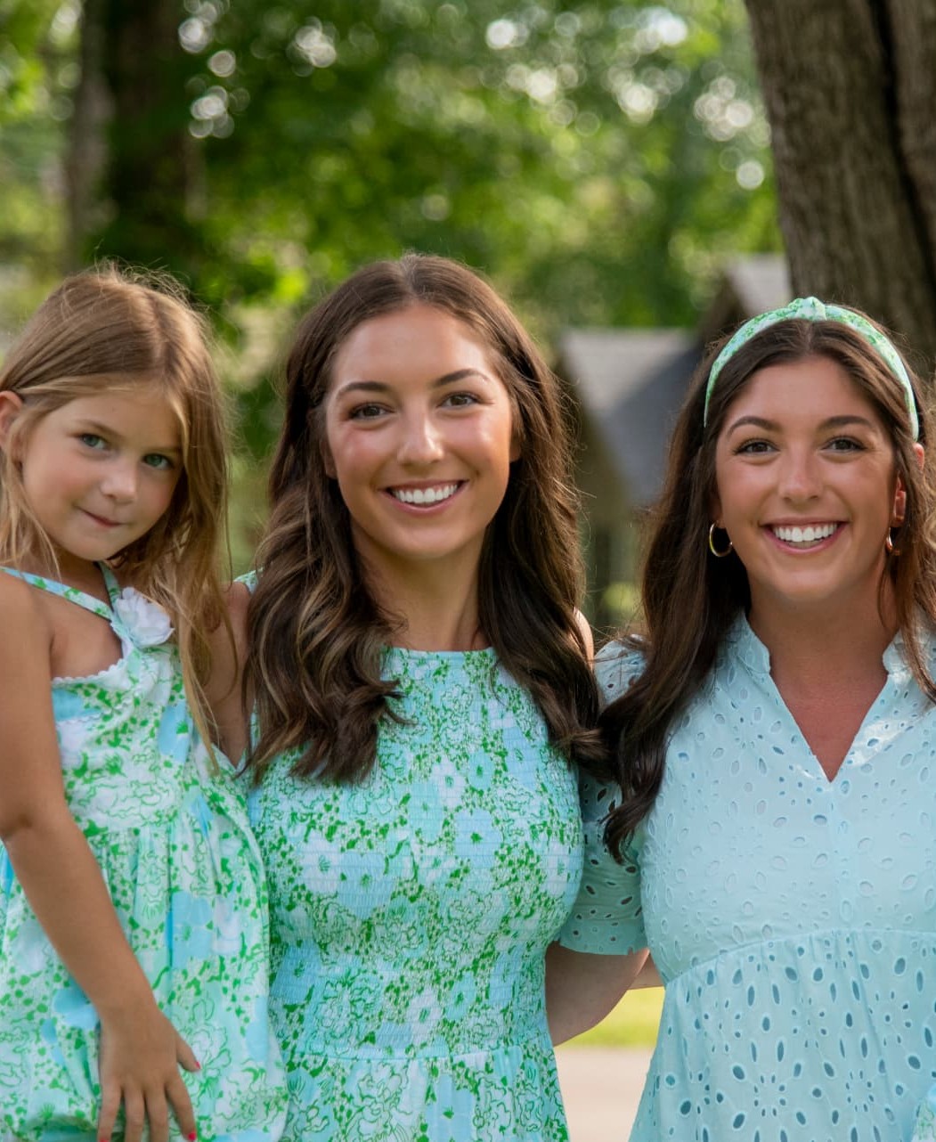 Annie Lawton outdoors with one of the girls she nannies